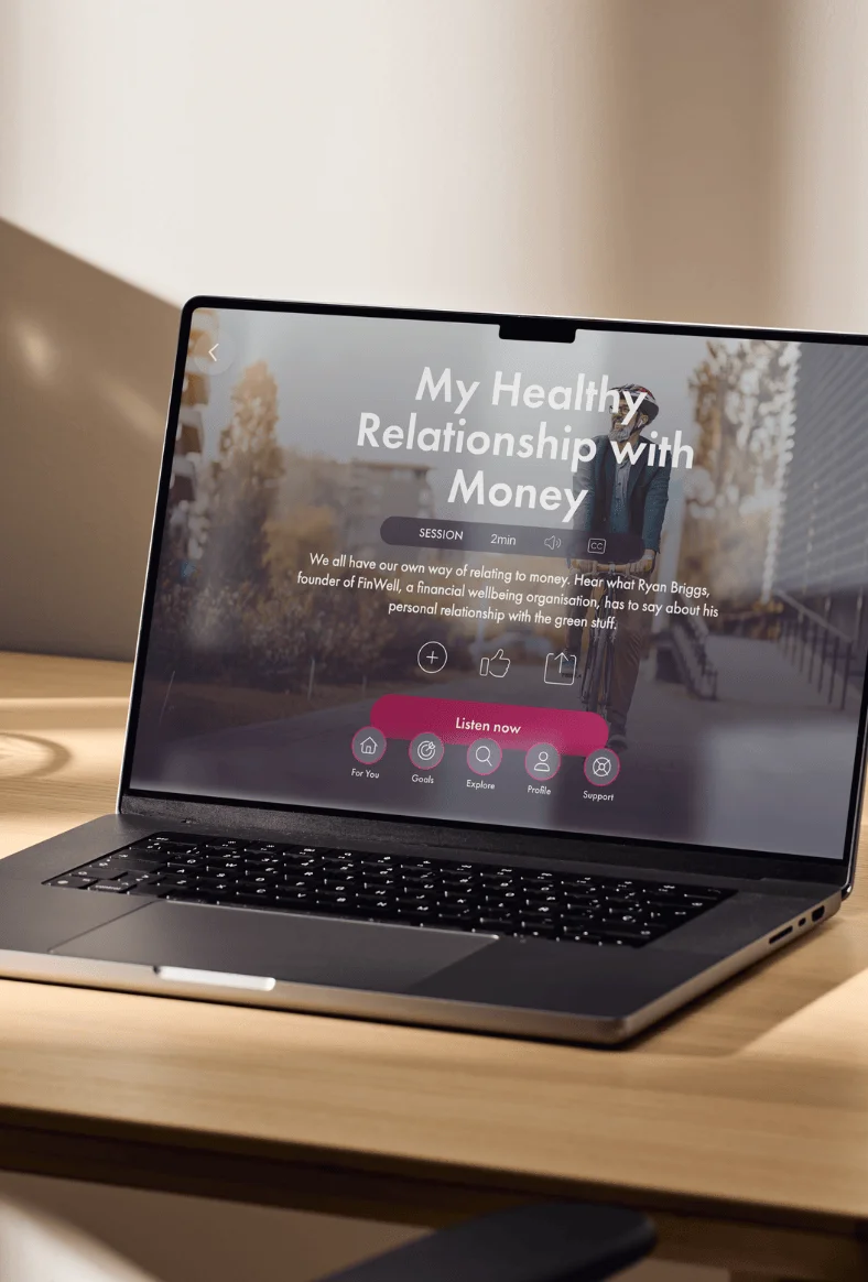 Laptop on desk with PAM wellness app open